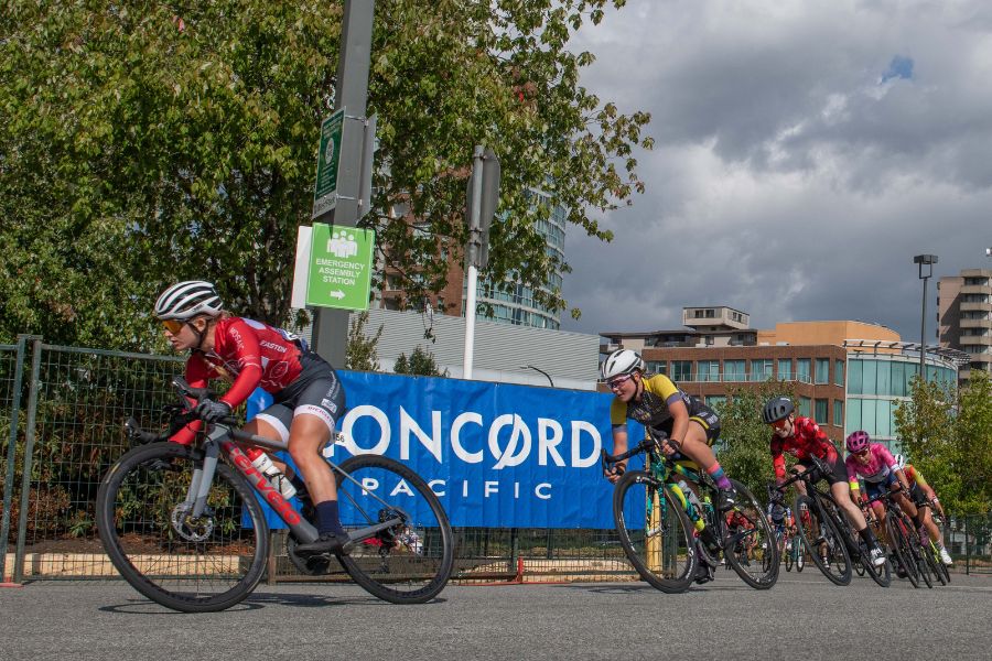 Female road cycling racers cornering right.