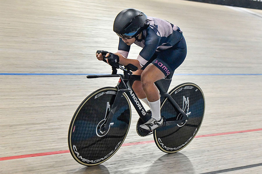 track cyclist in aero position