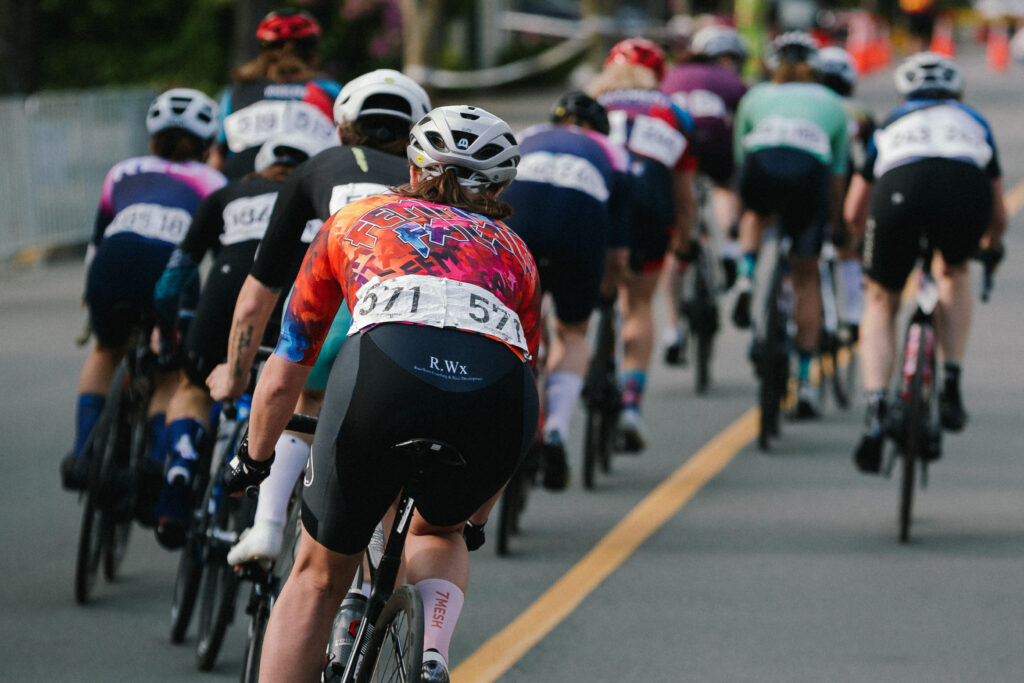 From behind view a group of road cyclists