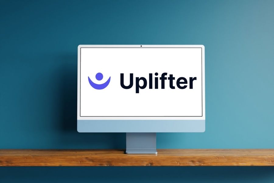 A blue desktop monitor displays the Uplifter logo.